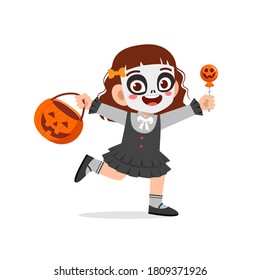 happy cute little kid boy and girl celebrate Halloween wears skeleton costume