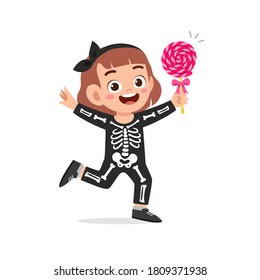 happy cute little kid boy and girl celebrate Halloween wears skeleton costume
