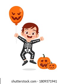 happy cute little kid boy and girl celebrate Halloween wears skeleton costume