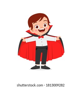 Happy Cute Little Kid Boy And Girl Celebrate Halloween Wears Dracula Vampire Costume With Cape