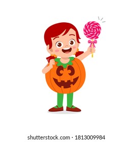 happy cute little kid boy and girl celebrate halloween wears pumpkin monster costume