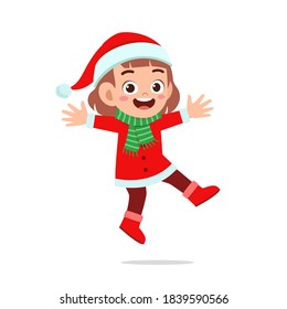 happy cute little kid boy and girl wearing red christmas costume and jump
