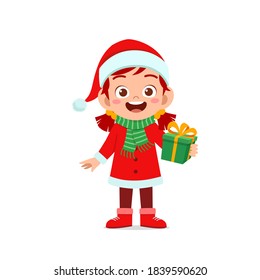 happy cute little kid boy and girl wearing red christmas costume and holding present