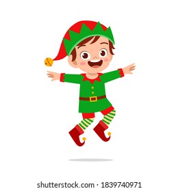 happy cute little kid boy and girl wearing green elf christmas costume