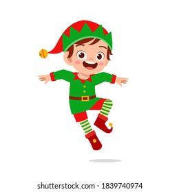 happy cute little kid boy and girl wearing green elf christmas costume