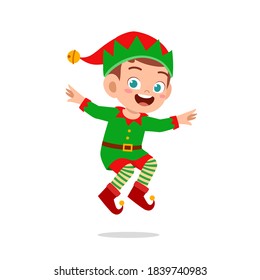 happy cute little kid boy and girl wearing green elf christmas costume
