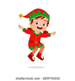 happy cute little kid boy and girl wearing green elf christmas costume