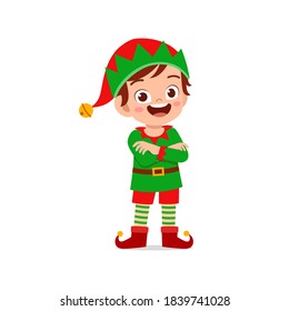 happy cute little kid boy and girl wearing green elf christmas costume