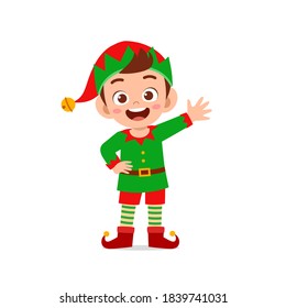 happy cute little kid boy and girl wearing green elf christmas costume