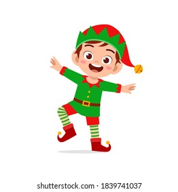 happy cute little kid boy and girl wearing green elf christmas costume