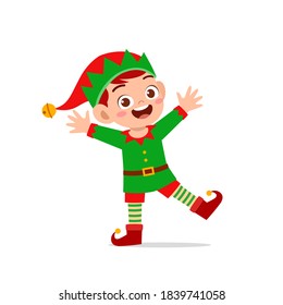 happy cute little kid boy and girl wearing green elf christmas costume