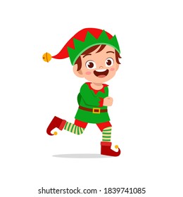 happy cute little kid boy and girl wearing green elf christmas costume