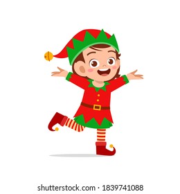 happy cute little kid boy and girl wearing green elf christmas costume