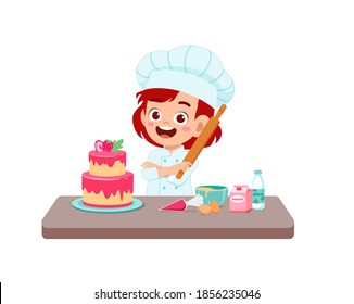 happy cute little kid boy and girl wear chef uniform and cooking a birthday cake