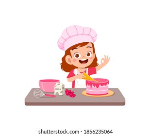 happy cute little kid boy and girl wear chef uniform and cooking a birthday cake