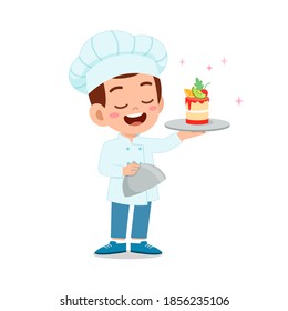 happy cute little kid boy and girl wear chef uniform and cooking a birthday cake