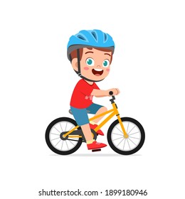 happy cute little kid boy riding bicycle