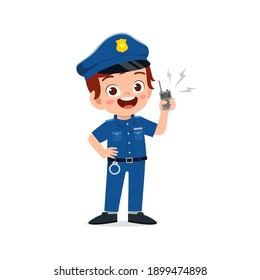 happy cute little kid boy wearing police uniform