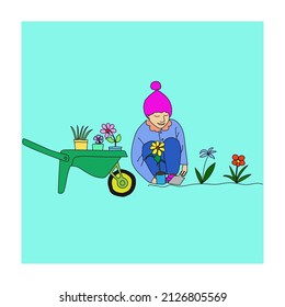 happy cute little kid boy and girl plant flower