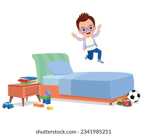 happy cute little kid boy jump on bed