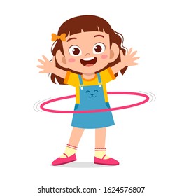 happy cute little kid girl play hula hoop