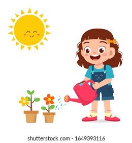 happy cute little kid girl watering flower