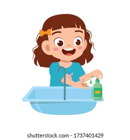 happy cute little kid girl wash hand in sink