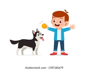 happy cute little kid play with dog