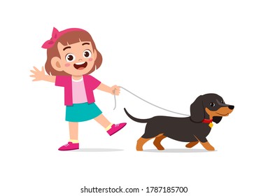 happy cute little kid play with dog