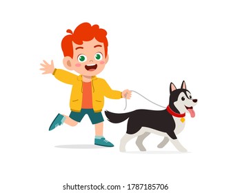 happy cute little kid play with dog