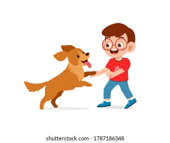 happy cute little kid play with dog