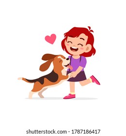 happy cute little kid play with dog