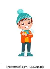 happy cute little kid play and wear jacket in winter season. child feeling chill wearing warm clothes