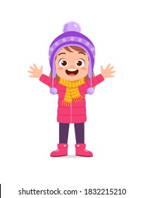 happy cute little kid play and wear jacket in winter season. child smile wearing warm clothes