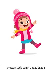happy cute little kid play and wear jacket in winter season. child smile wearing warm clothes