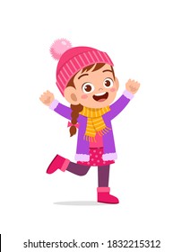 happy cute little kid play and wear jacket in winter season. child smile wearing warm clothes