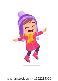 happy cute little kid play and wear jacket in winter season. child smile wearing warm clothes