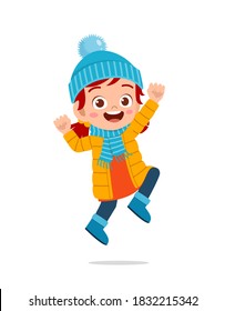 happy cute little kid play and wear jacket in winter season. child smile wearing warm clothes