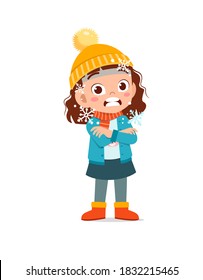 Happy Cute Little Kid Play And Wear Jacket In Winter Season. Child Feeling Chill Wearing Warm Clothes