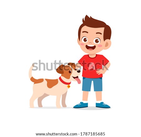 happy cute little kid play with dog