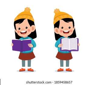 Happy cute little kid read book wearing warm clothes. Kid jacket in winter season
