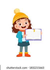 happy cute little kid study and wear jacket in winter season. child read book wearing warm clothes