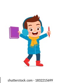 happy cute little kid study and wear jacket in winter season. child read book wearing warm clothes