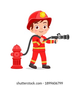happy cute little kid wearing firefighter uniform and holding hose
