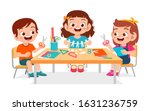 happy cute little kids boy and girl make paper craft