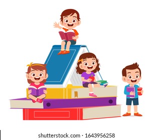 happy cute little kids boy and girl read book