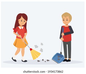 Happy cute little kids boy and girl helping each other to cleaning. The girl is sweeping the floor and the boy is holding trash scoop.