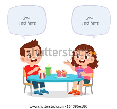 happy cute little kids boy and girl lunch together