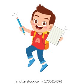 happy cute student kid boy with book and pencil