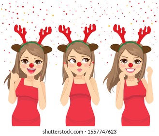 Happy dancing woman with deer headband and red nose celebrating Christmas